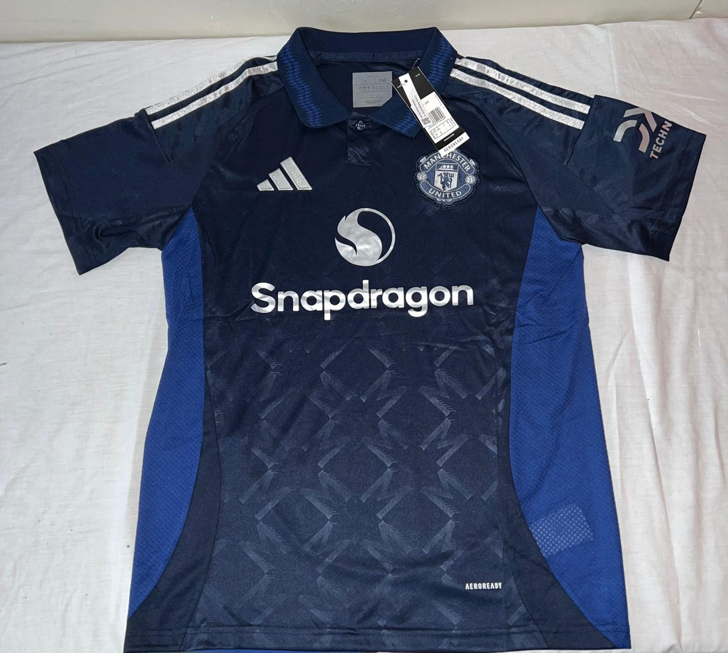 MANCHESTER UNITED AWAY 24/25 JERSEY